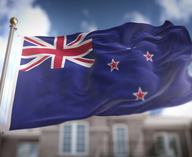 new-zealand-flag-flag-3d-rendering-blue-sky-building-background