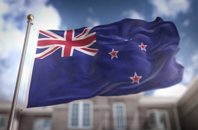 new-zealand-flag-flag-3d-rendering-blue-sky-building-background