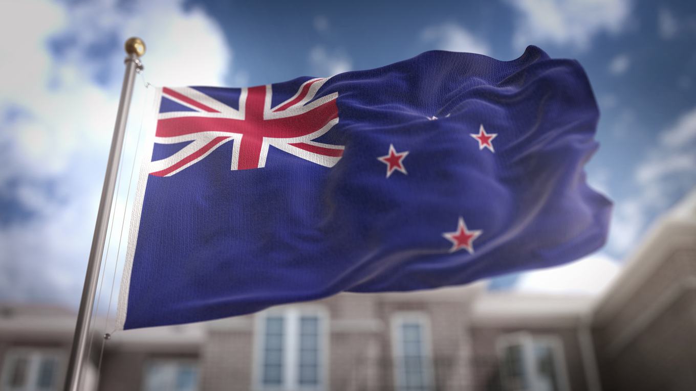 new-zealand-flag-flag-3d-rendering-blue-sky-building-background